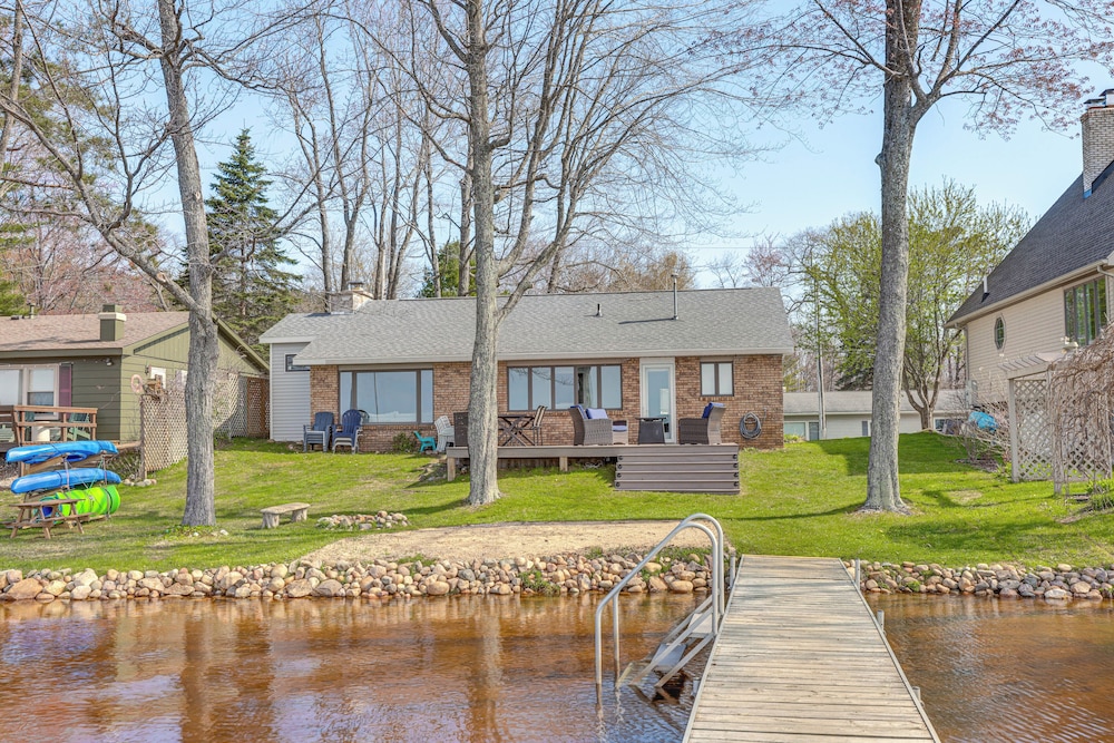 Dock & Views: Lake Mitchell Home in Cadillac!