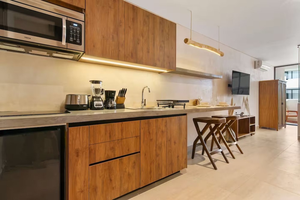 Guest INN Home - Elements Suites