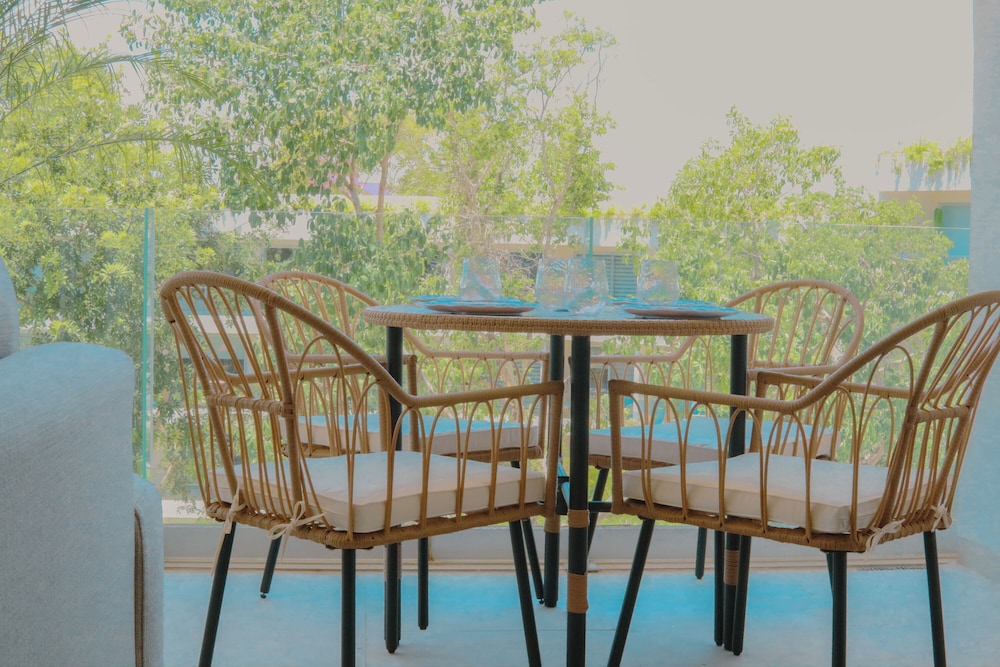 Stylish Playacar Condos w Balcony & Pool