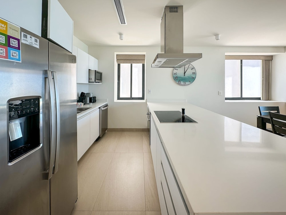 Brand-new Modern 2BR Gem on Iconic Sandy Beach