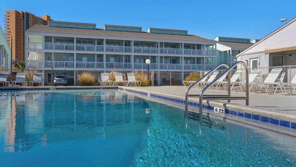 Beachside Stay w/ Pool & Beach Access + Free Attraction Tickets!