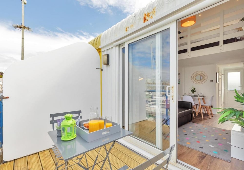 On the Water 3 Waterside Studio Mezzanine Bedroom Terrace Overlooking the Harbour view 2