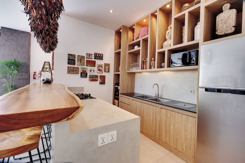 Luxury 4BR Haven, Steps to Canggu's Beach Elegance