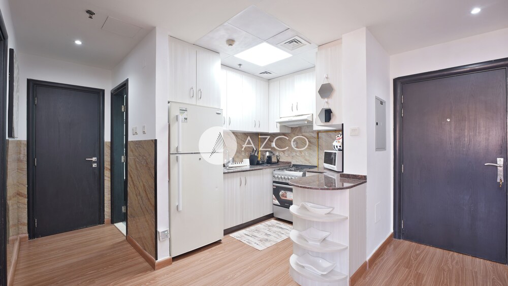 Cozy 1 BHK with City View in JVC by AZCO