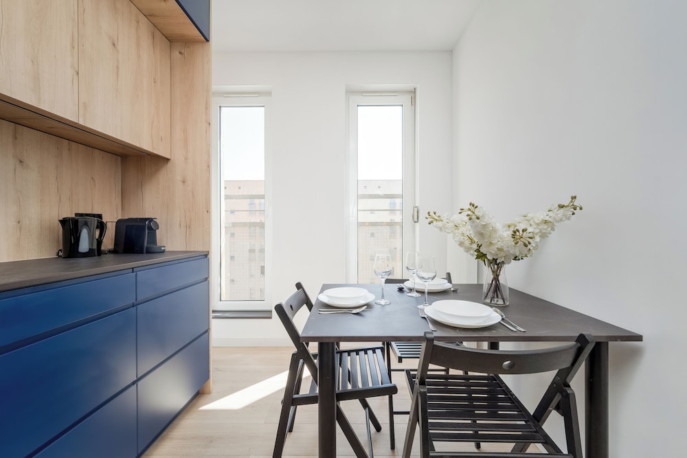 Wroclaw Dark Blue Apartment by Renters