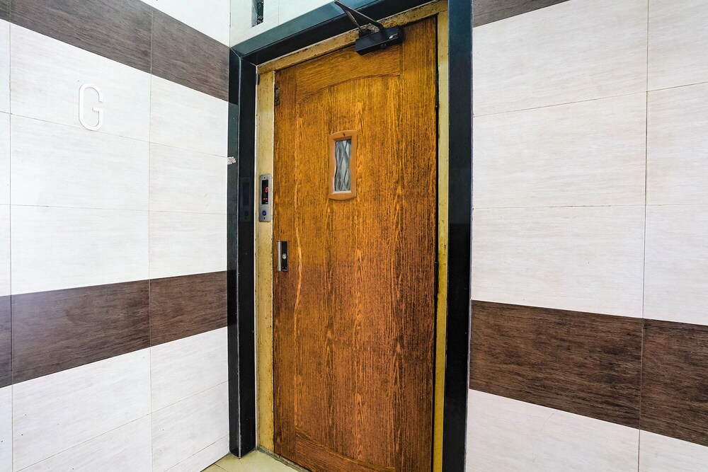 Fabhotel Wellax 24 Service Apartments