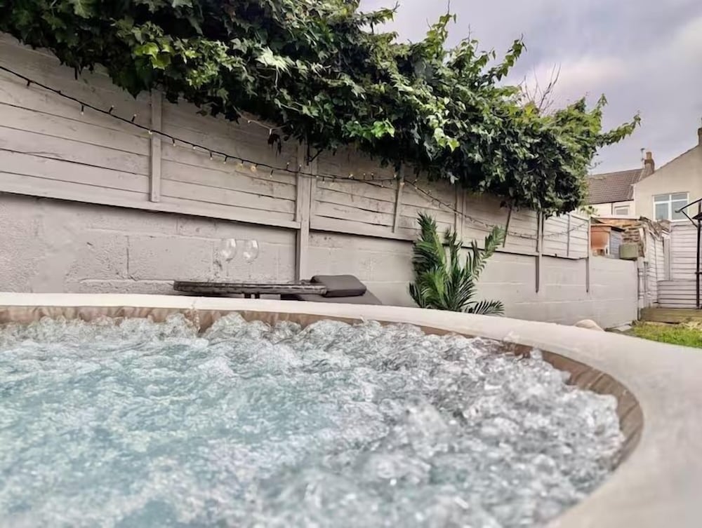 Central 3BR Home with Hot Tub Sleeps 10