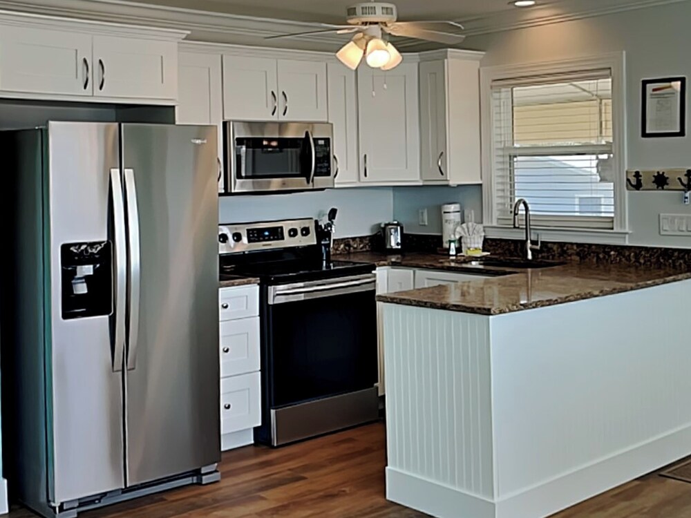 The Tides Retreat by Distinctive Beach Rentals