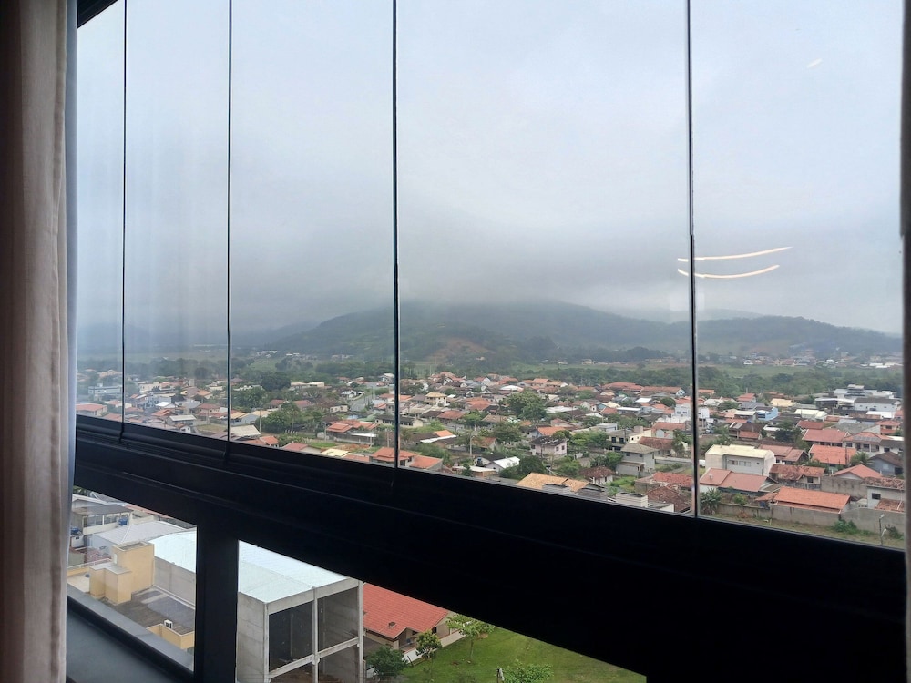 Estadia completa com piscina a 400m da Praia da Armação \- SKL