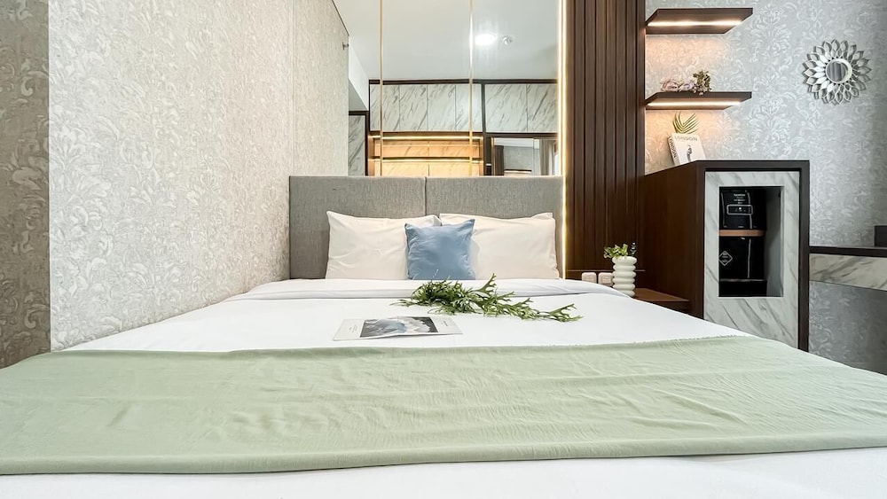 Earth Tone Studio Apartment At Transpark Bintaro