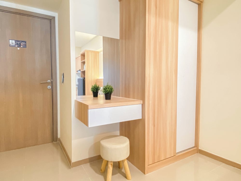 Warm Minimalist Studio Apartment Near Paramadina University At Meikarta