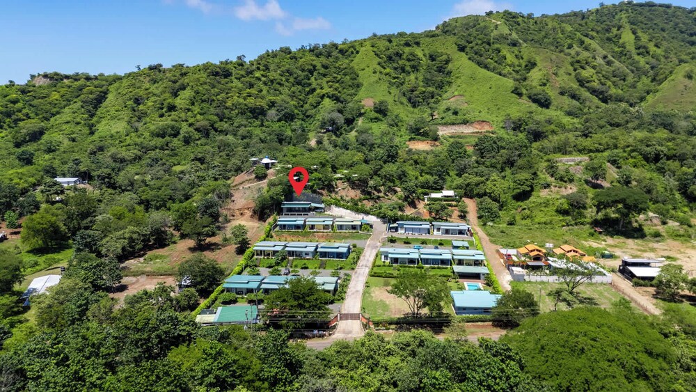 Modern Home with Lush Mountain Views and Spectacular Shaded Terrace in Private Gated Community