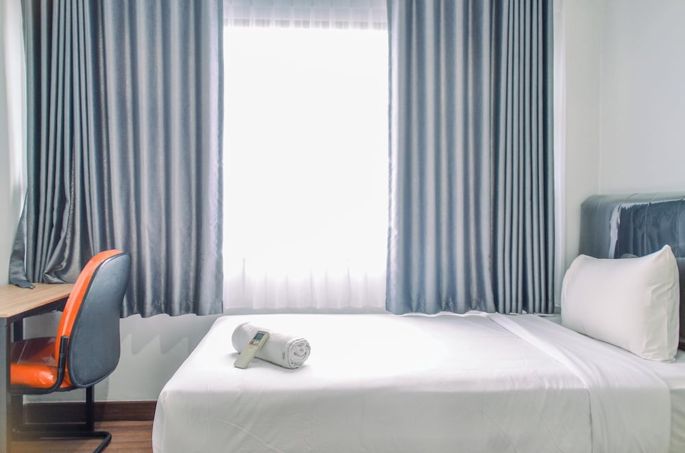 Chic and Cozy 2BR Apartment at Springwood Residence