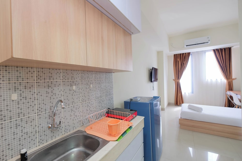 Warm And Cozy Studio At Evenciio Margonda Apartment