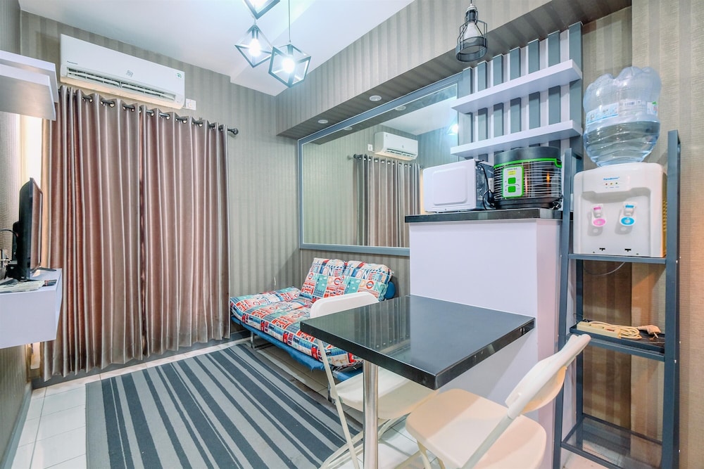 Homey and Cozy Living 2BR Podomoro Golf View Apartment