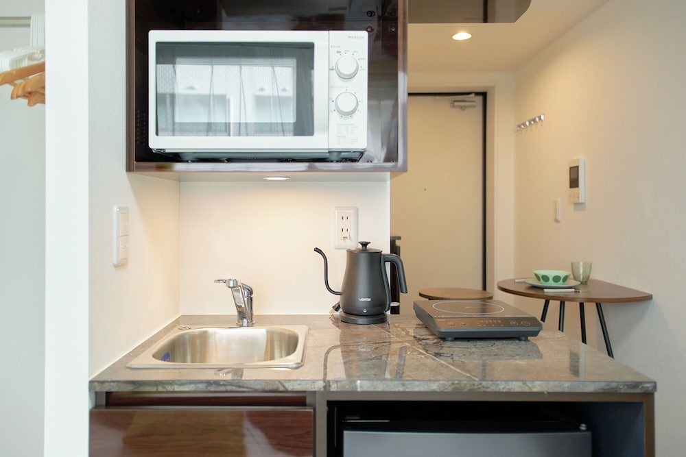 The under suite residence Ikebukuro by Tranova