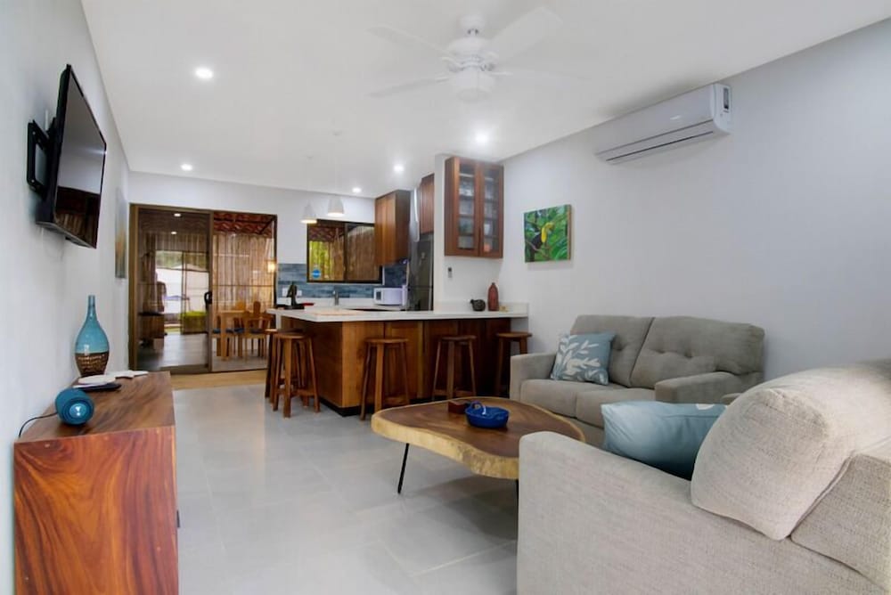 Minimalist Condo with a Beautiful New Design, Enclosed Patio, and Shared Community Pool