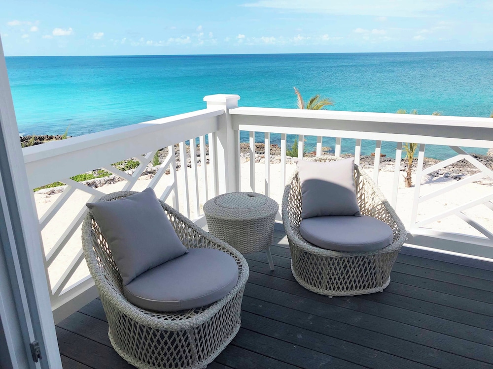 Oceanfront Haven: Elegant Estate With Private Deck