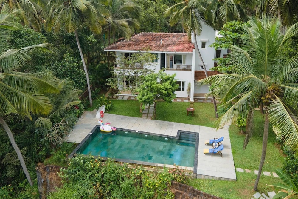 Frangipani by Hireavilla - 4BR w Pool Field View