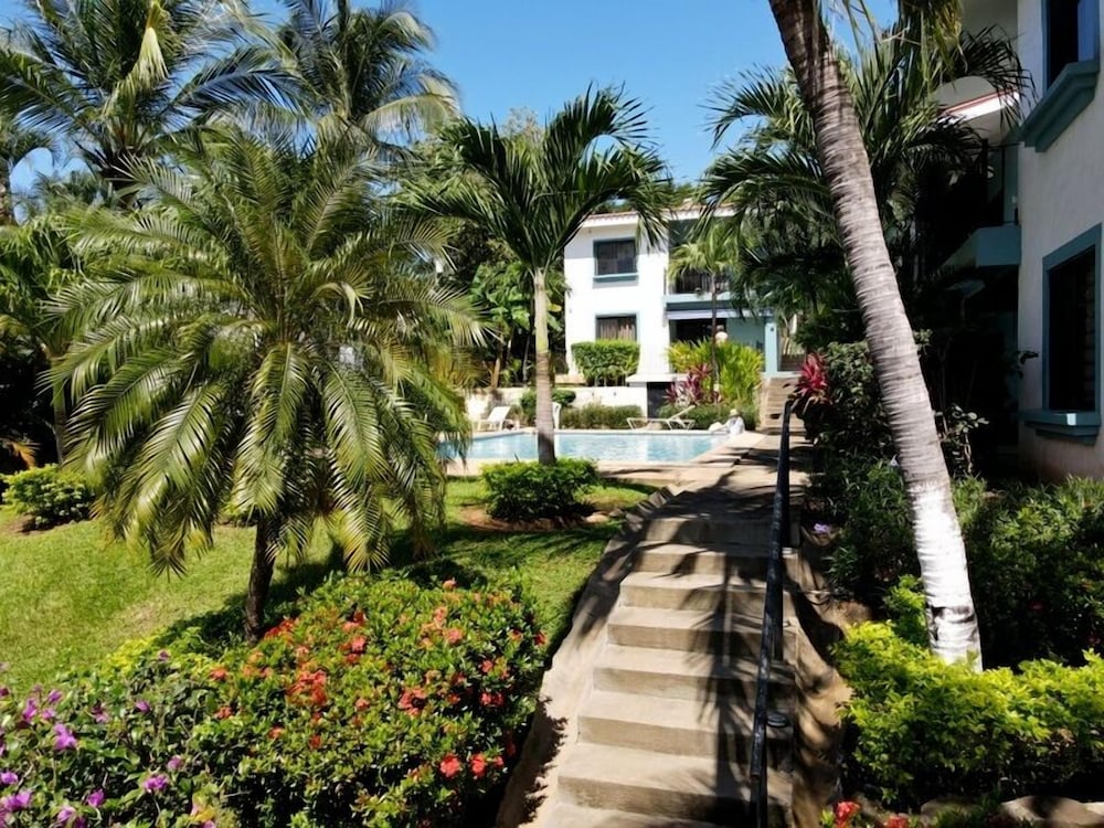 Minimalist Condo with a Beautiful New Design, Enclosed Patio, and Shared Community Pool