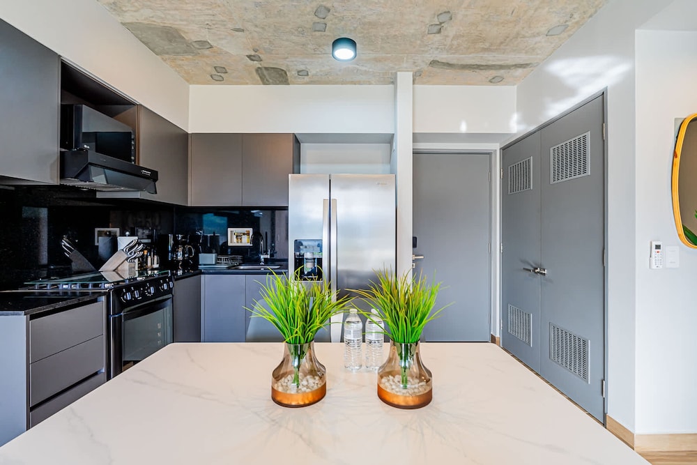 w Elegant 2BR Apartment in the Heart of Centriqo