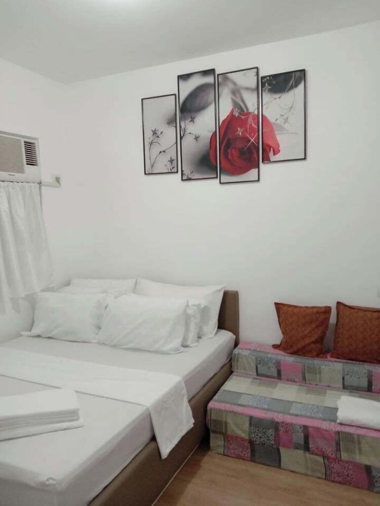2-bedroom next-door apartments are available, each good for 12 guests, just 3km or 3min ride to Pico de Loro Cove (we provide guest endorsement good for 1  view 2