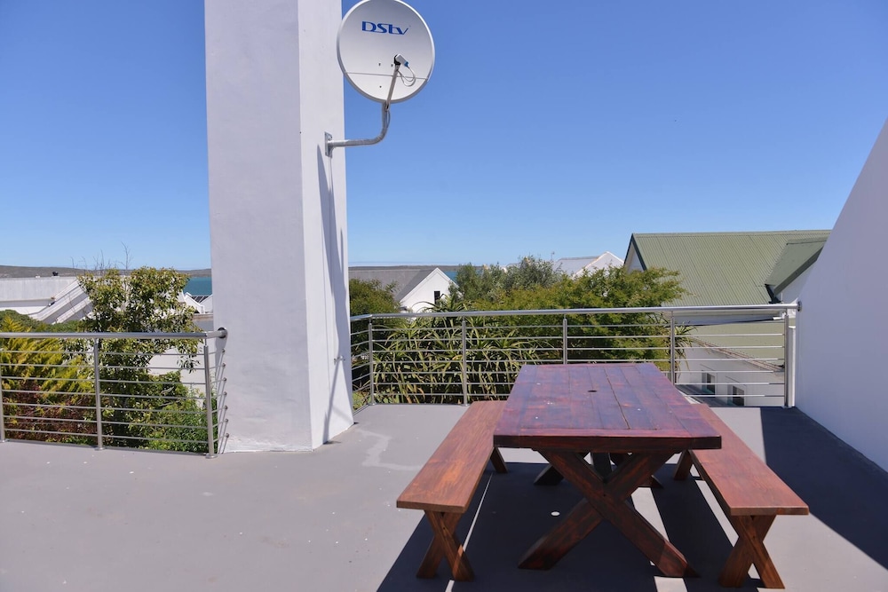 Pelican Cove is a Modern 4-bedroom Holiday Home in Langebaan With Some Sea Views