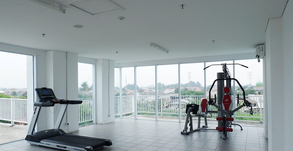 Homey And Cozy Living Studio At Poris 88 Apartment