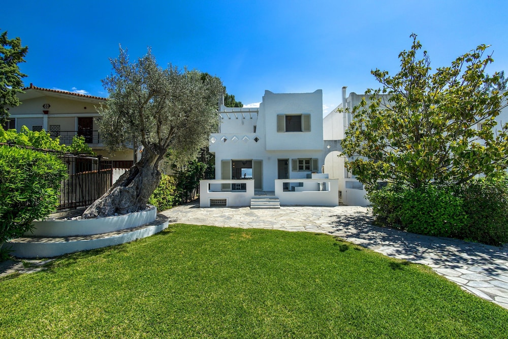 Salt Stone Beach Front Retreat by Estia