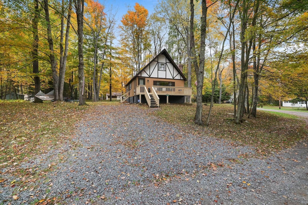 Game Room & Fire Pit: Tree-lined Pocono Lake Cabin view 3