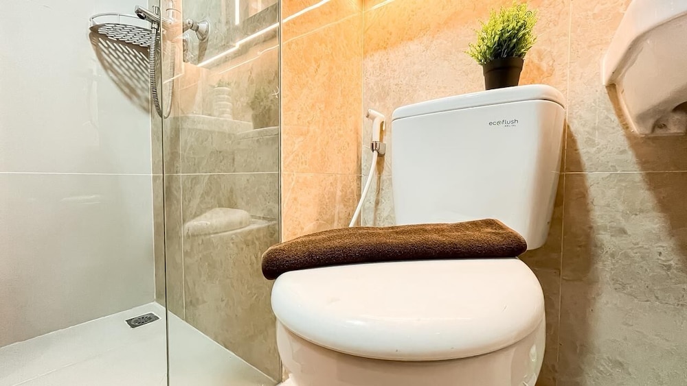 Earth Tone Studio Apartment At Transpark Bintaro