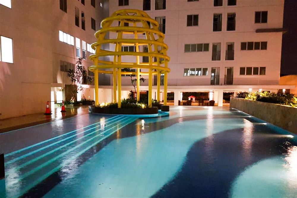 Homey And Strategic 2Br At Bassura City Apartment