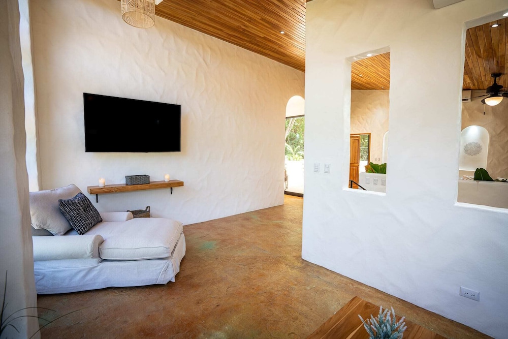 Bohemian Tropical Villa with a Tiki-Style Swimming Pool & Swim-Up Bar with an Attached Studio Apartment