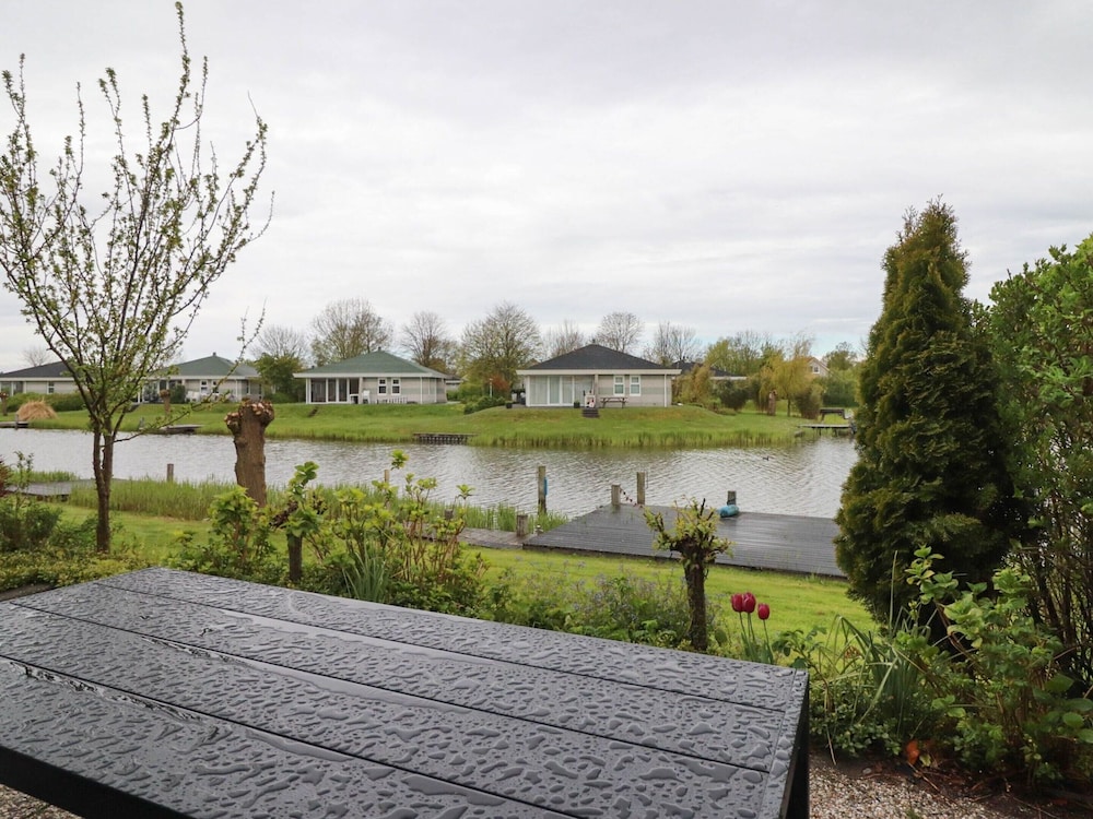 Nice Holiday Home on the Water in Friesland