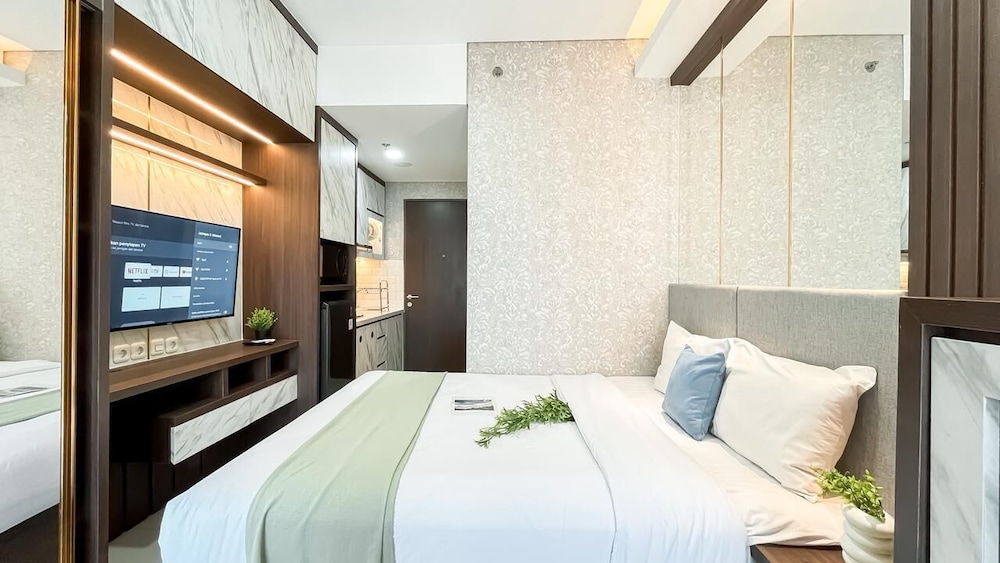 Earth Tone Studio Apartment At Transpark Bintaro