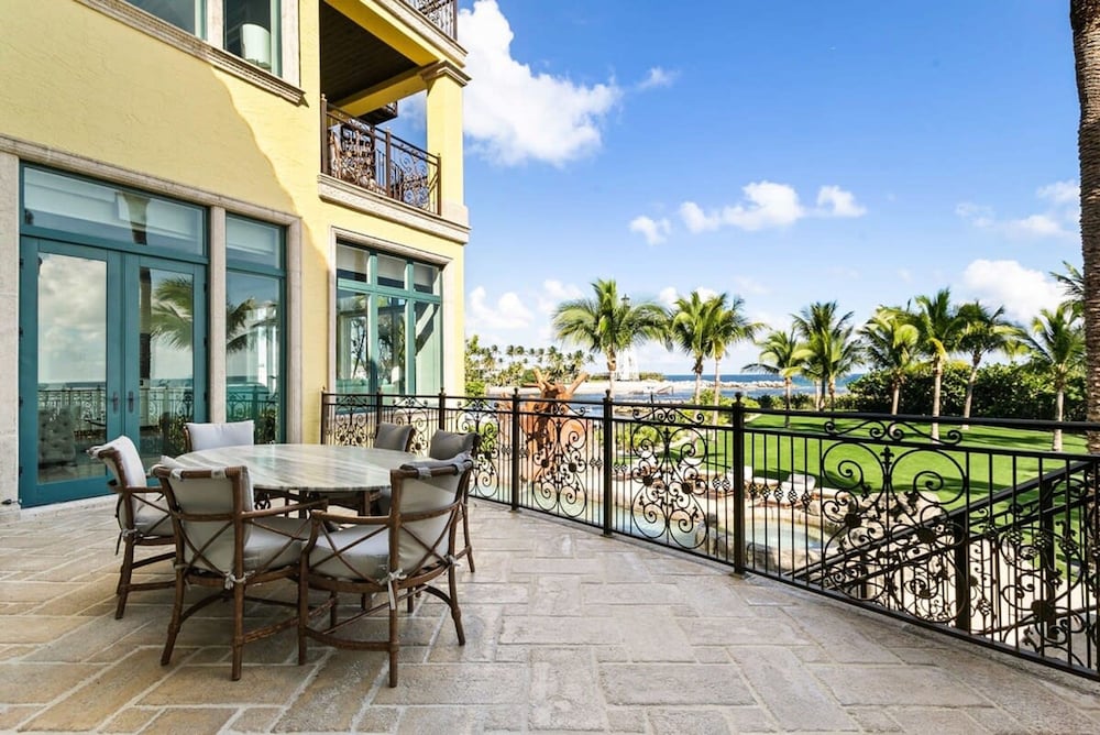 Luxurious 3-story Estate With Gym Pool Slide Private Beach and Lighthouse Views