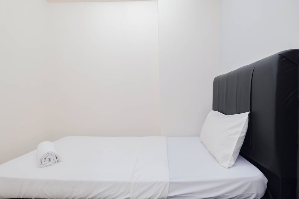 Comfort and Homey 2BR at Podomoro Golf View Apartment