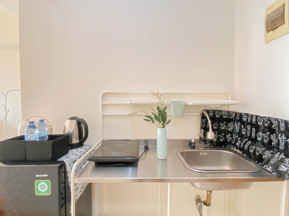 Cozy and Tranquil Studio at Podomoro Golf View Apartment