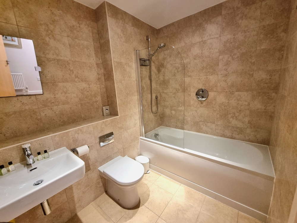 The Beach House & Porth Sands Apartments
