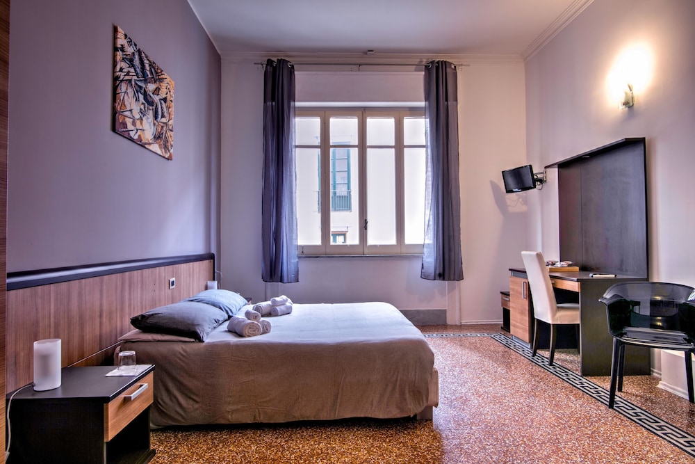 Maqueda Central Suites en Palermo — hotel room