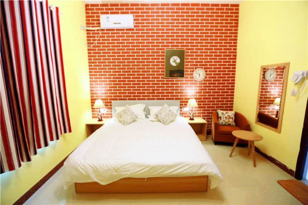 Weizhou Island Shengxiaguangnian Inn