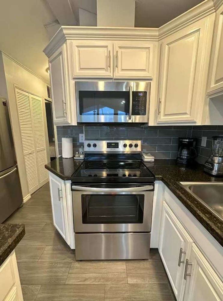 Stylish 2BR Waterfront Home w Pool Resort Access