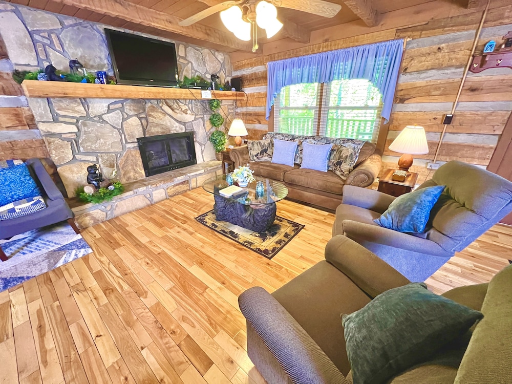 New Song Appalachian Chink Style Cabin features Foosball and Air Hockey Table by RedAwning