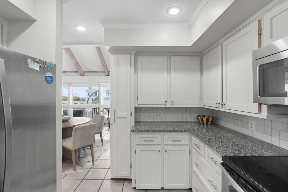 Beach Retreat w/ Sundeck, Golf Cart & Bikes Bungalow House by Avantstay