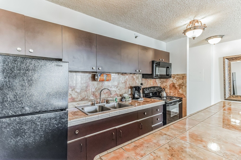 Waikiki Banyan Condo Located One Block From Waikiki Beach! by Koko Resort Vacation Rentals