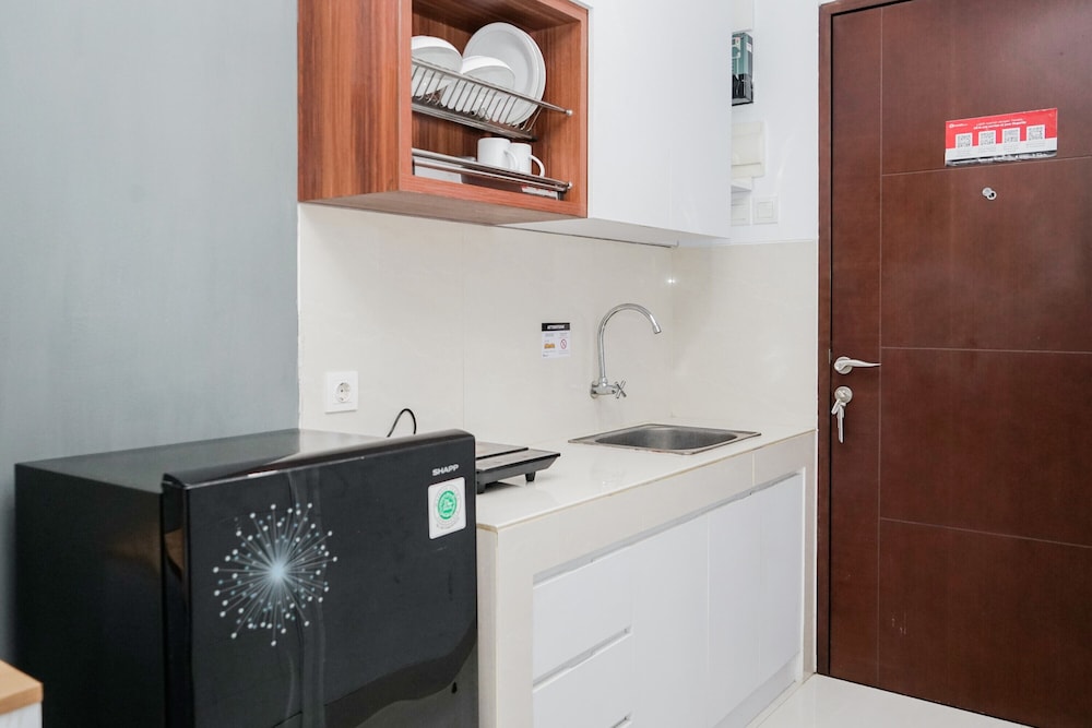 Comfort and Cozy Studio Room Apartment at Springwood Residence
