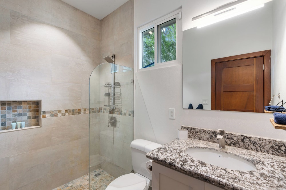 Beautiful home in a gated Neighborhood, Walking Distance to Beach with Garden