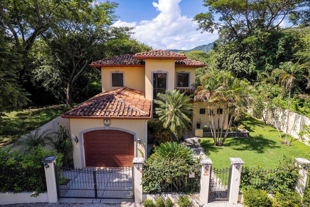 Inviting Home with Colorful Decor and Private Backyard Oasis with a Swimming Pool & Shaded Terrace