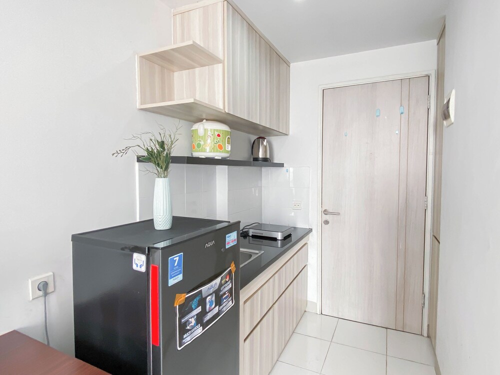 Basic Studio Room At Azalea Suites Apartment