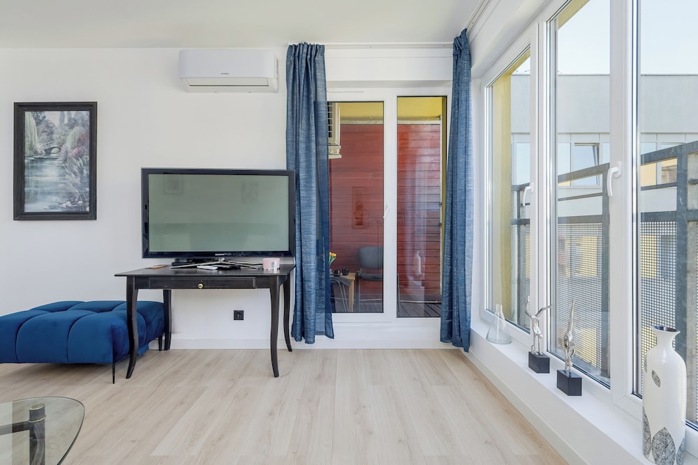 Wroclaw Dark Blue Apartment by Renters